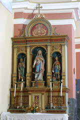 Fototapeta na wymiar Altar of the Immaculate Heart of Mary at St. Anne Church in Rozga, Croatia