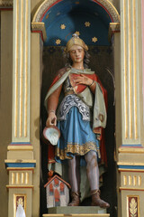Saint Florian statue on the altar of the Immaculate Heart of Mary in the Church of Saint Anne in Rozga, Croatia