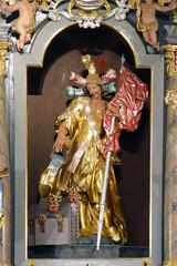 Saint Florian statue on the altar of Saint Florian in parish church Saint George in Gornja Stubica,...
