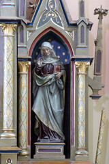 Fototapeta premium St. Anne's statue at Our Lady's altar at St. Roch Church in Luka, Croatia