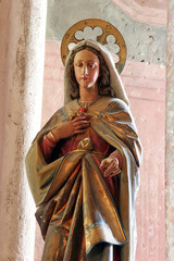 Immaculate Heart of Mary statue on the main altar in the Church of the Assumption of the Virgin Mary in Taborsko, Croatia