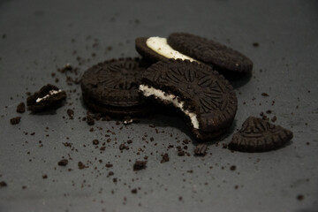 Cookies and cream with crumbs around them