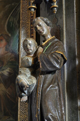 Obraz premium St. Anthony of Padua with baby Jesus statue at St. Lawrence Altar at St. Nicholas Church in Gornji Miklous, Croatia