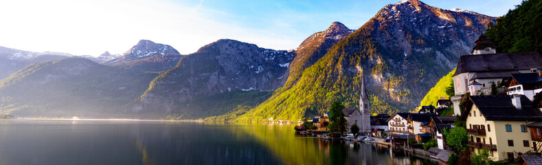 Fototapeta premium Panorama view of Landscape view Famous Hallstatt mountain village and alpine lake, Austrian Alps