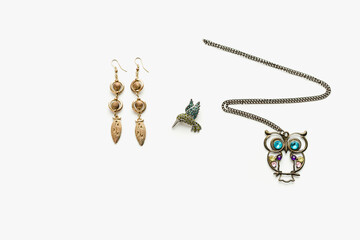 jewelry on a white background, owl pendant