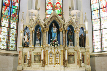 Fototapeta na wymiar Main altar in Holy Trinity Parish Church in Donja Stubica, Croatia