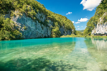 Fototapeta na wymiar Pure Plitvice lakes on a cloudless sunny day in Croatia