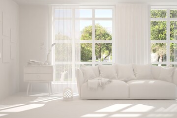 Stylish room in white color with sofa and green landscape in window. Scandinavian interior design. 3D illustration