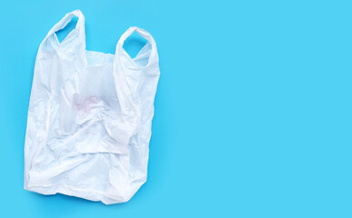White plastic bag on blue background.