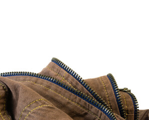 Close up of layer of brown denim and open golden zip track looks beautiful isolated on white background