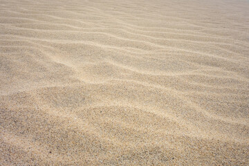 Fototapeta na wymiar Sand detail on Ponta preta beach in Santa Maria, Sal Island, Cape Verde
