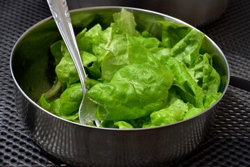 Closeup of fresh green salad/ lettuce in the bowl