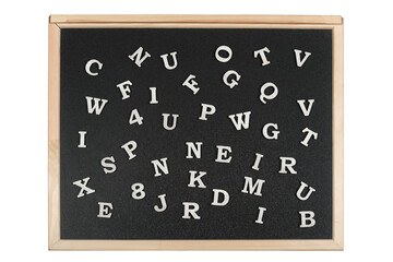 White numbers and letters of English alphabet on black magnetic board. Learning of letters and...