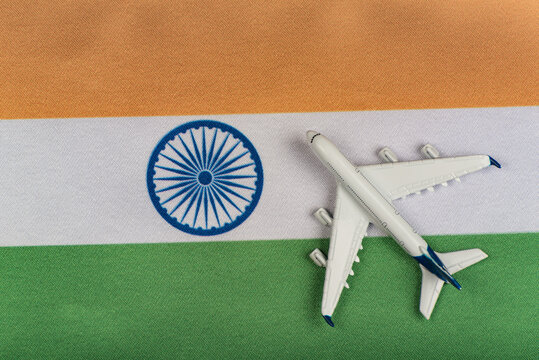 Flag of India and airplane. Resumption of flights after quarantine. Flights to India