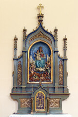 Obraz premium Altar of Our Lady of Mount Carmel in the parish church of St. George and the Immaculate Heart of Mary in Kaniska Iva, Croatia