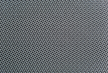 Light grey background. Geometric pattern. Woven material. Horizontal and vertical threads. Wicker decorative surface.
