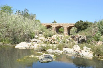 Fototapeta na wymiar Bridge and river, Pont Vell, Santa Eulalia, Ibiza. 