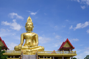 Big golden Buddha, background is blue sky