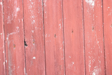 Beautiful vintage red background with old red paint with rough surface, streaks and uneven texture...