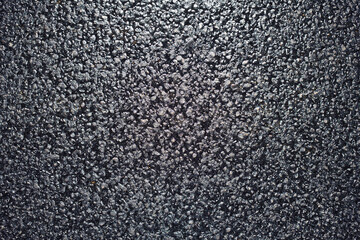 Texture of fresh and new black asphalt. Background of new asphalt