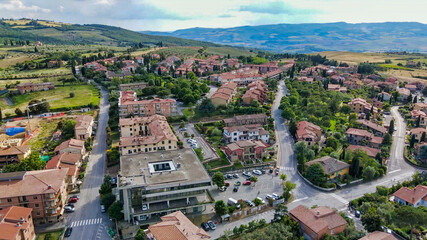 Amazing aerial view of San Quirico medieval town in Tuscany