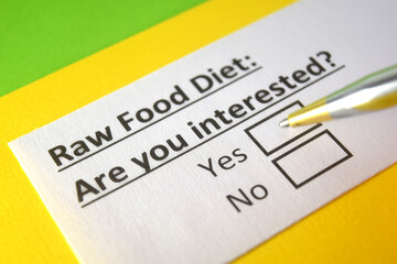 Obraz premium One person is answering question about raw food diet.