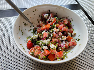 vegetable salad in a white bowl
