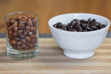 chocolate almonds and nuts in a glass on the table