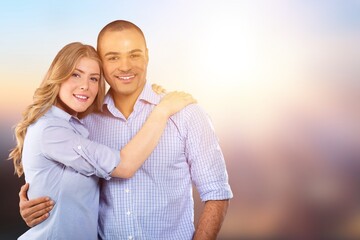Obraz premium Young happy couple hugging each other