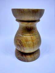 Wooden craft jars for spices. Isolate on a white background. Selective focus.