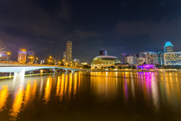 Cityscape of Singapore skyline at night time. Marina Bay is a bay located in the Central Area of Singapore