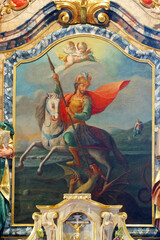 Fototapeta premium Saint George slaying the dragon, altar painting on the high altar in the chapel of Saint George at the Lake in Klanjecko Jezero, Croatia