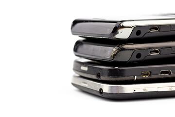 Stack of old, rubbish smartphones