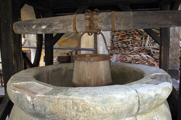 Old ancient water well with wooden buckets in Veliki Tabor castle, Croatia © zatletic