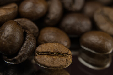 Fragrant fried coffee beans. close-up texture