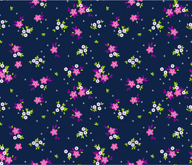 Cute floral pattern in the small flower. Ditsy print. Motifs scattered random. Seamless vector texture. Elegant template for fashion prints. Printing with small pink flowers. Dark blue background.
