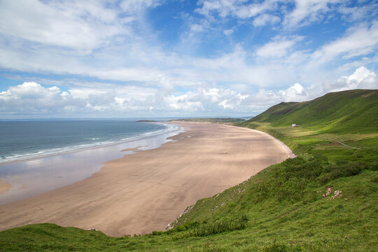 Rhohssili Bay on the Gower peninsular in Wales, UK - known for its natural beauty with sand dunes & prehistoric remains.