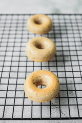 Mini donuts on a baking grid