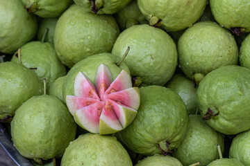 Fresh organic guavas fruits background.