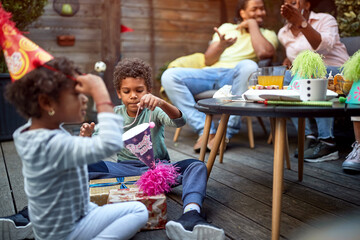 Kids having fun on home birthday party