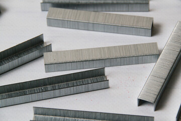 Concept of repair and construction. Construction brackets on a gray background view from the top