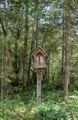 Religious sign in the woods in Slovenia