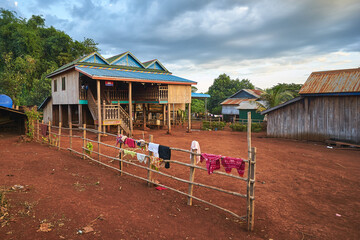 Fototapeta na wymiar Rich khmer stilt house in a cambodian village