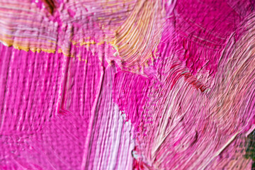 Abstract pink background with oil paint on canvas. Abstract art background. Creative process. Closeup of strokes of the painting. Design background with hand work. The art of oil painting.