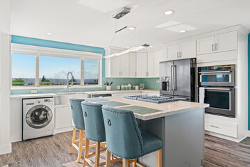 White modern kitchen interior with navy blue accents