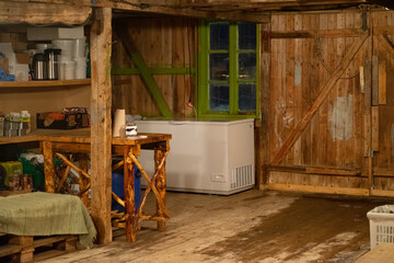 Fototapeta na wymiar Norwegian wooden cabin as storage and workshop.