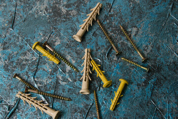 lot of dowels on the background of decorative putty blue