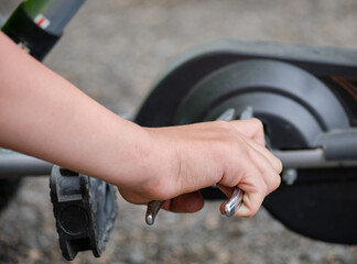 Child repairs his children 's car