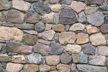 The masonry of the ancient wall consists of regular-shaped stone blocks