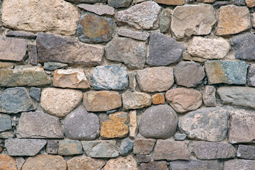 The masonry of the ancient wall consists of regular-shaped stone blocks